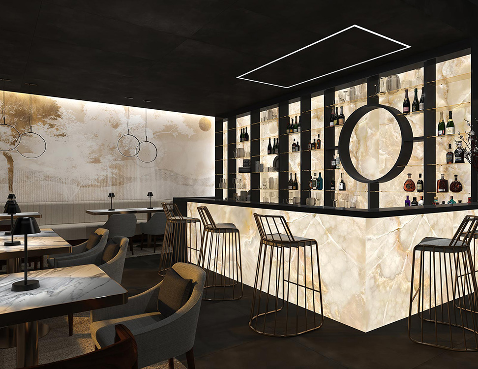 Lounge bar de diseño con papel pintado efecto metalizado y paneles luminosos de Tecnografica